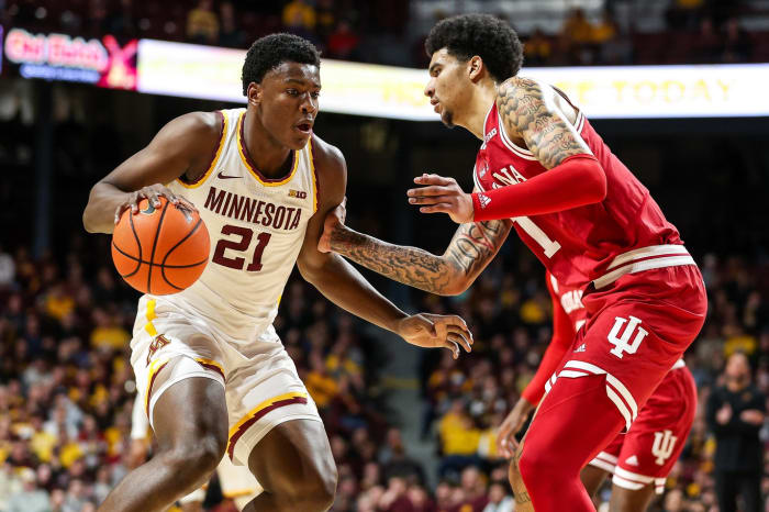 Minnesota Golden Gophers forward Pharrel Payne (21) works around Indiana Hoosiers center Kel'el Ware (1) during the first half at Williams Arena.